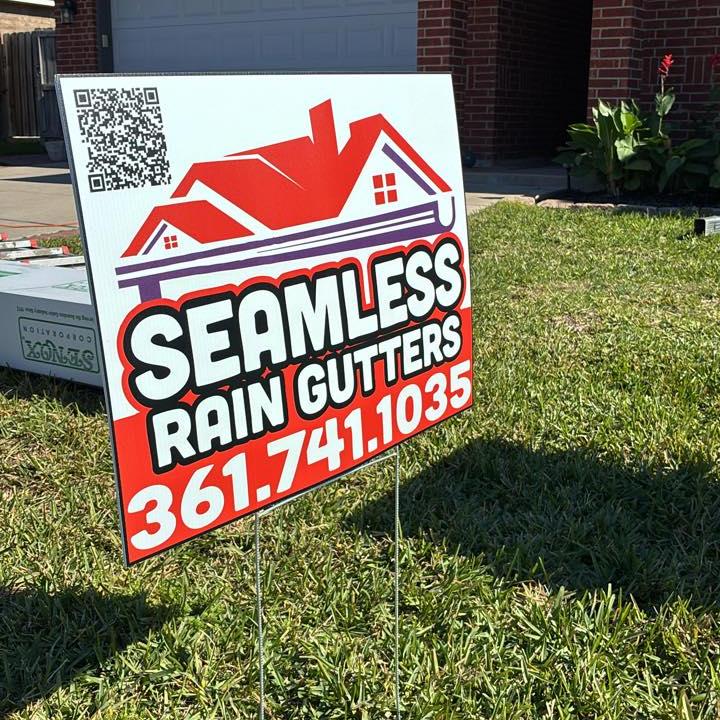 Gutter Guy yard sign — Seamless Rain Gutters, 361.741.1035 — staked on a finished job